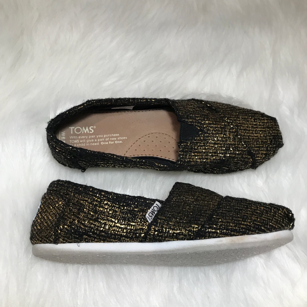 Women’s Black And Gold Sparkly Toms 6.5